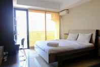 Kamar Tidur Homey Studio Apartment at 6th Floor Beverly Dago By Travelio