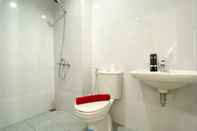 In-room Bathroom Enjoy Living Studio Apartment at Patraland Urbano By Travelio