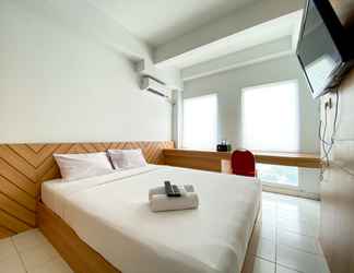 Bedroom 2 Enjoy Living Studio Apartment at Patraland Urbano By Travelio