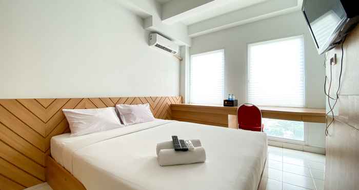 Bedroom Enjoy Living Studio Apartment at Patraland Urbano By Travelio