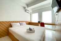 Bedroom Enjoy Living Studio Apartment at Patraland Urbano By Travelio