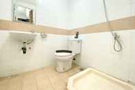 In-room Bathroom Comfort Designed 2BR Apartment at Metropark Condominium Jababeka By Travelio