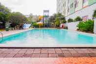 Swimming Pool Homey Studio at Dian Regency Apartment By Travelio