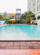 SWIMMING_POOL Homey Studio at Dian Regency Apartment By Travelio