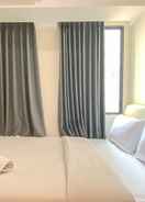 BEDROOM Simply Look Studio Apartment at Osaka Riverview PIK 2 By Travelio