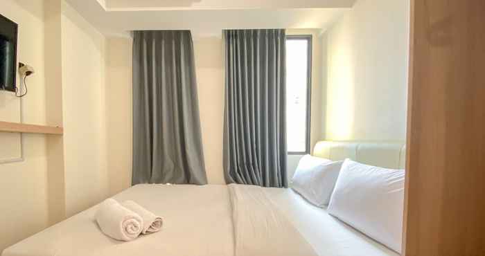 Kamar Tidur Simply Look Studio Apartment at Osaka Riverview PIK 2 By Travelio