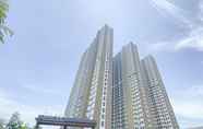 Bangunan 5 Simply Look Studio Apartment at Osaka Riverview PIK 2 By Travelio