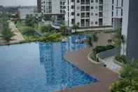 Swimming Pool Warm and Simply Look Studio Apartment at Akasa Pure Living BSD By Travelio