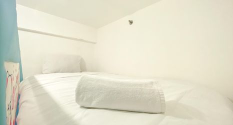 Bedroom 2 Best Startegic 2BR Apartment at Bassura City By Travelio