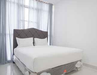 Bedroom 2 Exclusive Studio Apartment at Gold Coast By Travelio