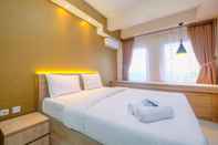 Kamar Tidur Comfortable Studio at Patraland Urbano Apartment By Travelio