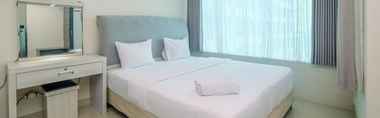 Kamar Tidur 2 Minimalist Studio Apartment at Grand Kamala Lagoon By Travelio