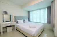 Bedroom Minimalist Studio Apartment at Grand Kamala Lagoon By Travelio