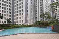 Swimming Pool Cozy and Simply 3BR Apartment at M-town Residence By Travelio