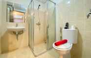 In-room Bathroom 6 Minimalist and Comfy 1BR at The Wave Kuningan Apartment By Travelio