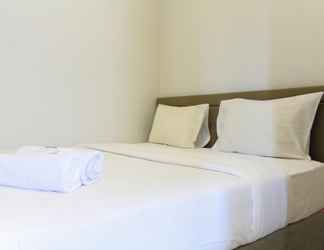 Bedroom 2 Simple and High Floor 1BR at The Mansion Apartment Kemayoran By Travelio