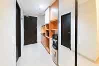 Lobby Cozy Designed Studio Apartment at Patraland Amarta By Travelio