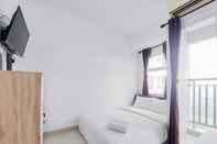 Bedroom Enjoy Living and Cozy Studio Room at Serpong Garden Apartment By Travelio