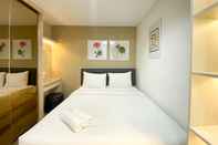 Kamar Tidur Comfort Stay and Great Choice 2BR at Patraland Urbano Apartment By Travelio