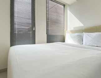 Bedroom 2 Simply and Cozy Studio Room at Osaka Riverview PIK 2 Apartment By Travelio