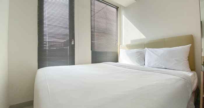 Kamar Tidur Simply and Cozy Studio Room at Osaka Riverview PIK 2 Apartment By Travelio