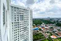 Bangunan Comfot Studio Apartment at 28th Floor Patraland Urbano By Travelio