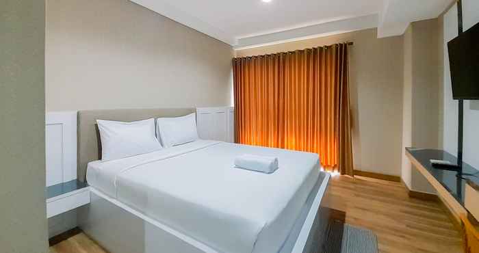 Kamar Tidur Homey and Great Deal Studio Room Patraland Amarta Apartment By Travelio