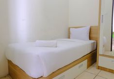 卧室 5 Homey and Cozy 2BR Tamansari Panoramic Apartment By Travelio