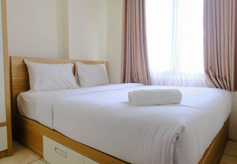 Bedroom Homey and Cozy 2BR Tamansari Panoramic Apartment By Travelio