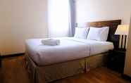 Bedroom 2 Cozy and Homey 3BR at Braga City Walk Apartment By Travelio