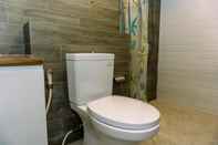 In-room Bathroom Elegant and Nice 2BR Apartment at Springhill Terrace Residence By Travelio