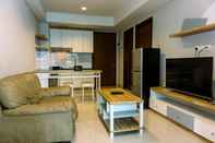 Common Space Elegant and Nice 2BR Apartment at Springhill Terrace Residence By Travelio