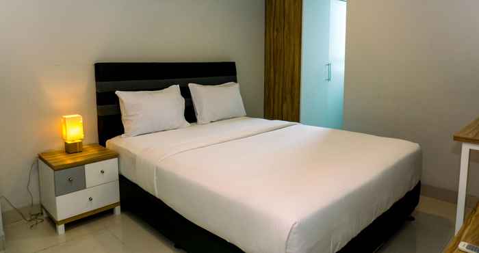 Kamar Tidur Elegant and Nice 2BR Apartment at Springhill Terrace Residence By Travelio