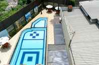 Swimming Pool Comfort 2BR Apartment at 6th Floor Metropark Condominium Jababeka By Travelio