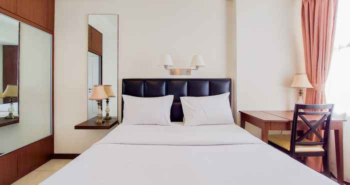 Kamar Tidur Elegant and Tidy 1BR Silkwood Residences Apartment By Travelio