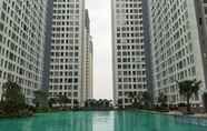 Swimming Pool 7 Chic and Clean Studio Apartment M-Town Residence near Summarecon Mall By Travelio