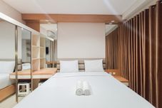 臥室 Homey Studio at Apartment Patraland Amarta By Travelio