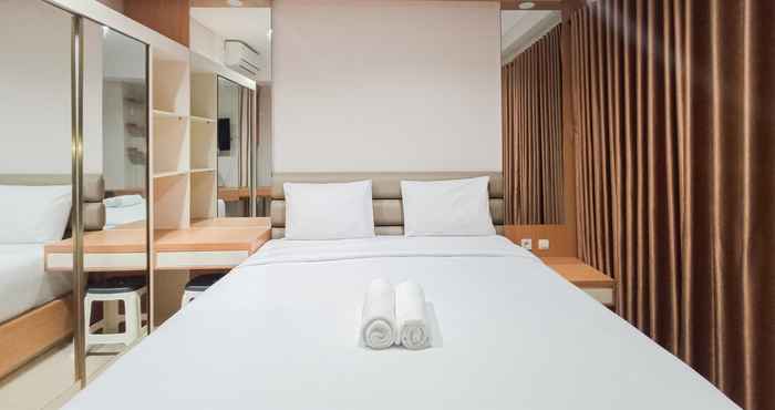 Bedroom Homey Studio at Apartment Patraland Amarta By Travelio