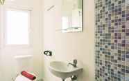 In-room Bathroom 7 Tidy and Homey Studio Room Aeropolis Apartment By Travelio
