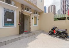 Bangunan 2 RedDoorz Plus near Taman Rasuna Menteng