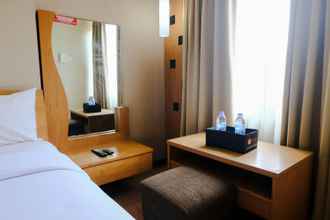 Bedroom 4 Cozy Studio Room Apartment at Grand Setiabudi By Travelio