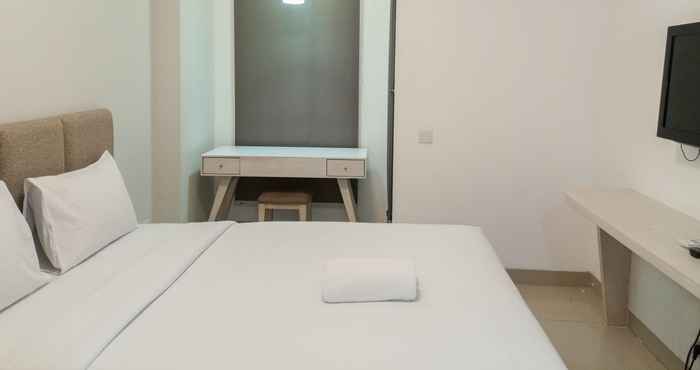 Kamar Tidur Cozy Studio Apartment at Barsa City By Travelio