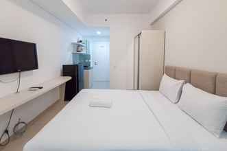 Kamar Tidur 4 Cozy Studio Apartment at Barsa City By Travelio