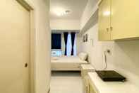 Ruang Umum Enjoy and Homey Living Studio Tokyo Riverside PIK 2 Apartment By Travelio