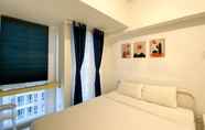 Kamar Tidur 6 Enjoy and Homey Living Studio Tokyo Riverside PIK 2 Apartment By Travelio