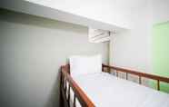 Kamar Tidur 7 Comfy and Homey 2BR at Dian Regency Apartment By Travelio