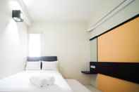 Kamar Tidur Comfy and Homey 2BR at Dian Regency Apartment By Travelio