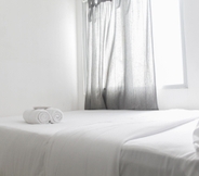 Kamar Tidur 2 Enjoy and Minimalist 2BR at Bassura Apartment near Bassura Mall By Travelio