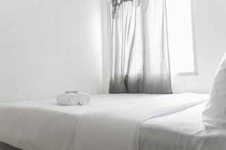 Phòng ngủ 4 Enjoy and Minimalist 2BR at Bassura Apartment near Bassura Mall By Travelio