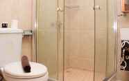 In-room Bathroom 7 Cozy Living Studio Room Apartment at Metropark Condominium Jababeka By Travelio